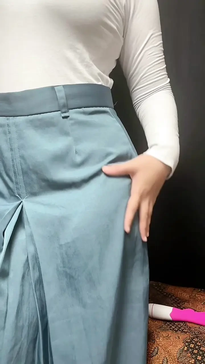 Masturbating